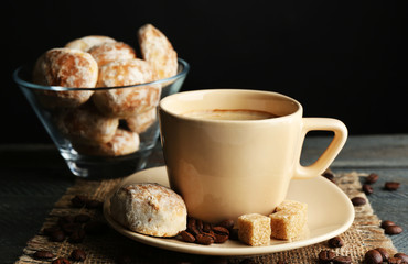Cup of coffee and tasty cookies