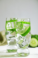 Glasses with fresh organic cucumber water
