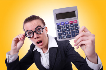 Nerd female accountant with calculator