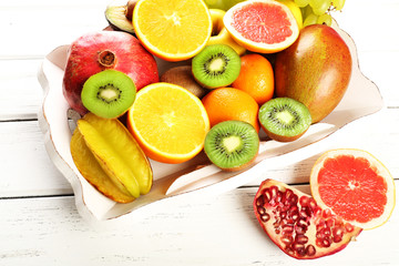 Assortment of fruits on wooden table