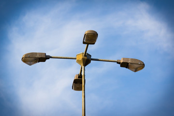 Street lamps on blue sky