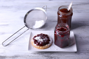 Delicious cookie with jam and powdered sugar