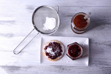 Delicious cookie with jam and powdered sugar