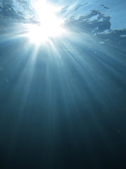 Fototapeta na wymiar Light rays underwater