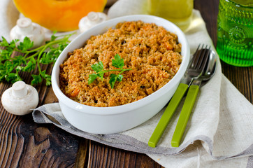 Casserole of rice, squash and mushrooms
