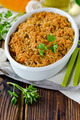 Casserole of rice, squash and mushrooms