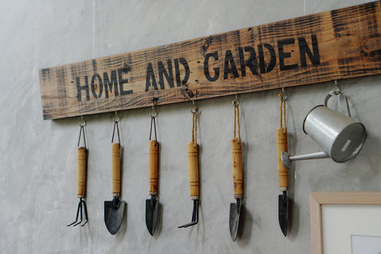 Small Garden Tools Hanging On The Wall