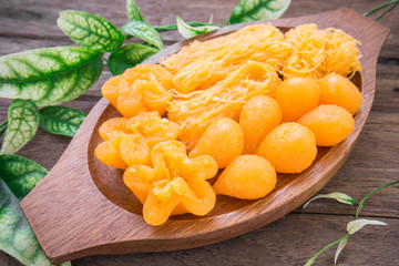 Thai dessert golden sweetmeat on plate