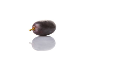 Black grapes over white background