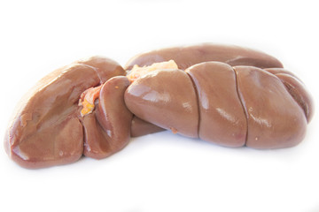 Raw beef kidney on a white background