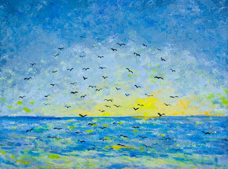 Sunset at the sea, birds in the sky