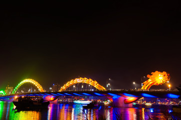 Orange Dragon Bridge at night Danang Vietnam