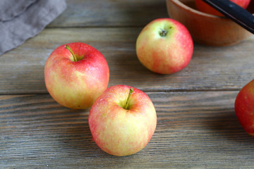 Delicious apples on wooden boards