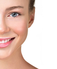 Beautiful woman with white teeth. Attractive sincere smile. Clea