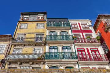 Obraz premium The typical colorful buildings of the Ribeira District in Porto