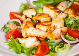Vegetable salad with roasted chicken breast