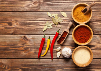 Assortment of spices on a wooden table
