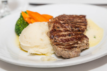 Strip Steak with Mashed Potatoes