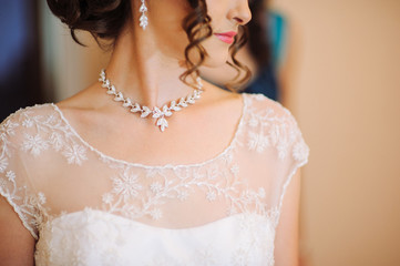 a woman's neck line on her wedding day.