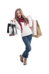 Exited shopping woman carrying bags