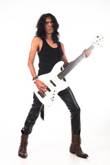 Long hair rock n roll guy playing guitar