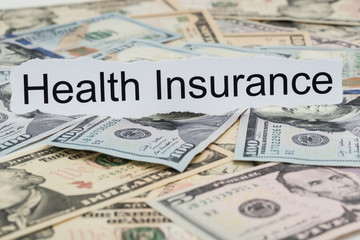 Health Insurance Text On Piece Of Paper