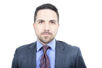 A beautiful business man standing against grey background