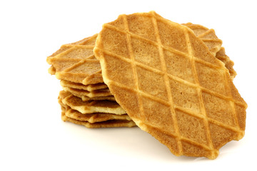 freshly baked stacked Dutch waffles on a white background