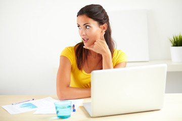 Adult woman secretary surfing the web