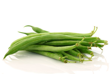 bunch of green beans on a white background