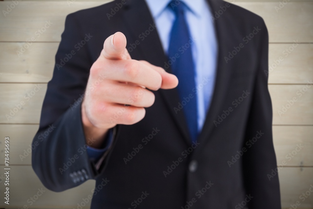 Poster composite image of businessman pointing his finger at camera