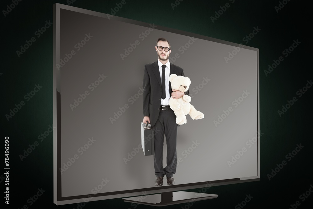 Poster Composite image of geeky businessman holding briefcase and teddy