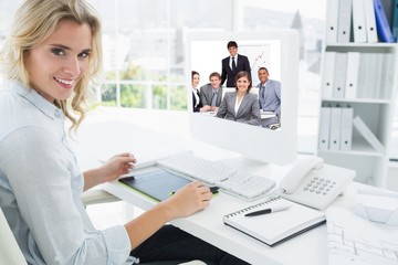 Composite image of happy business group having a meeting