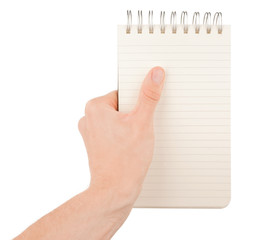 Hand writing on empty notepad (notebook) isolated on white