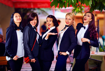 gorgeous girls posing in black suits