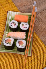 Sushi set on wooden background