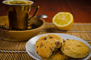 coockies with tea on wooden table