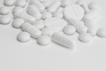 Medicine - many pills / tablets - white background