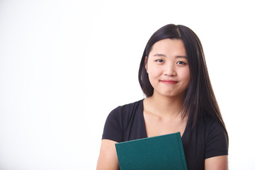 Obraz premium Young Asian standing with book smiling