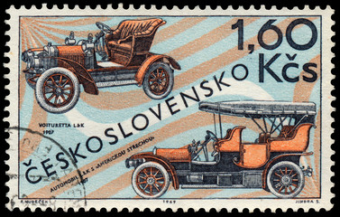 Fototapeta na wymiar Stamp printed in Czechoslovakia shows old cars