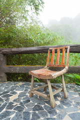 Wooden chair on the balcony