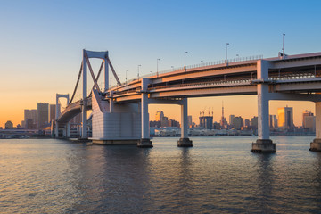 Sunset at Rainbow bridge with Tokyo tower in background