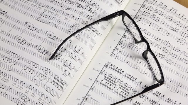 Sheet music with glasses