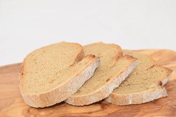 A slice of bread on a chopping board.