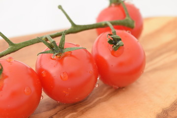 Cherry tomatoes. Ripe red mini tomatoes.