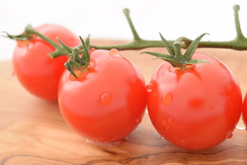 Cherry tomatoes. Ripe red mini tomatoes.