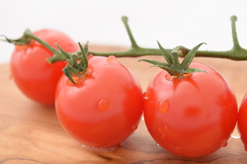Cherry tomatoes. Ripe red mini tomatoes.
