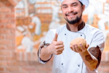 Handsome cook in the kitchen