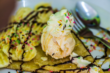 Chocolate pancakes with banana