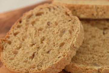 A slice of bread on a chopping board.